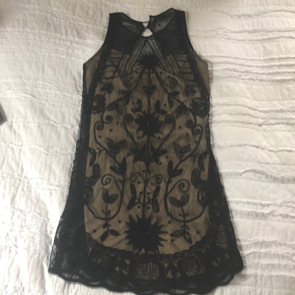 Black, beaded 1920s-styled mini dress